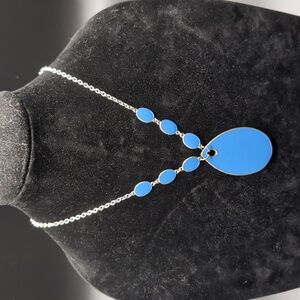 Silver Toned Necklace With Blue Enameled Focus